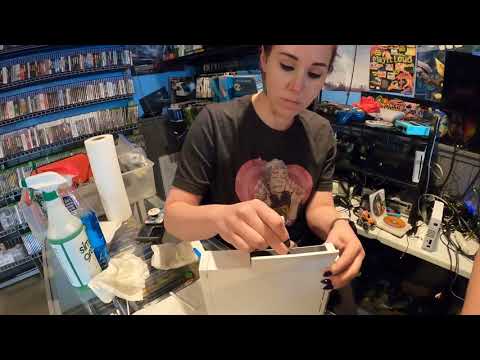1 Hour of Synthwave While a Girl Cleans Retro Video Games! [ASMR] [Synthwave] [Relaxing]