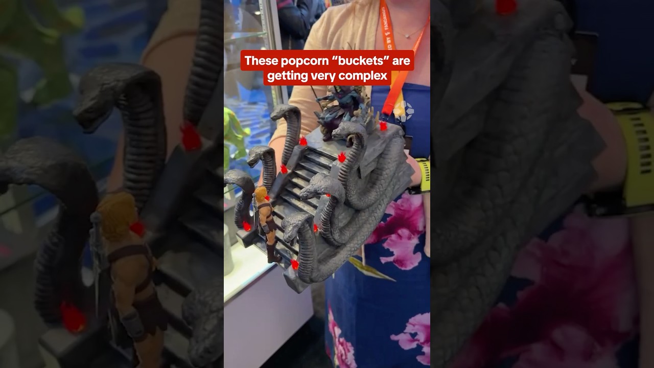 These popcorn buckets from Masters of the Universe are basically toys #cinemacon #motu #popcorn #ign